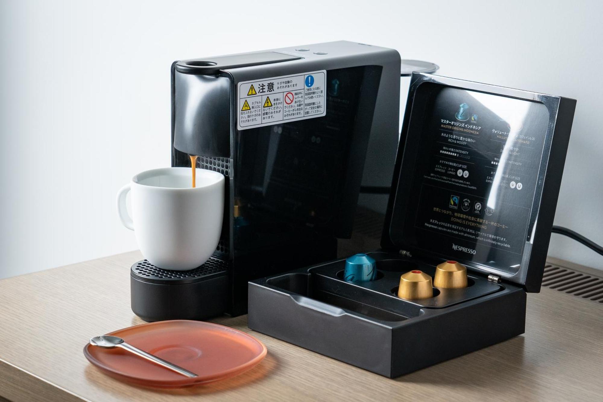 The Royal Park Hotel Iconic Kioto Zewnętrze zdjęcie A Nespresso coffee machine